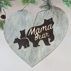 image of painted heart with mother bear and three cubs